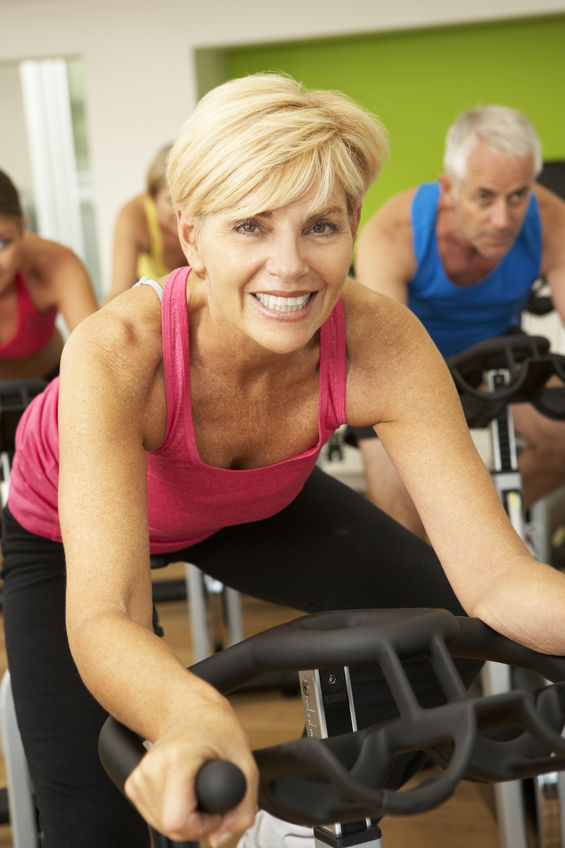 42248868 – woman taking part in spinning class in gym – Trish Allan